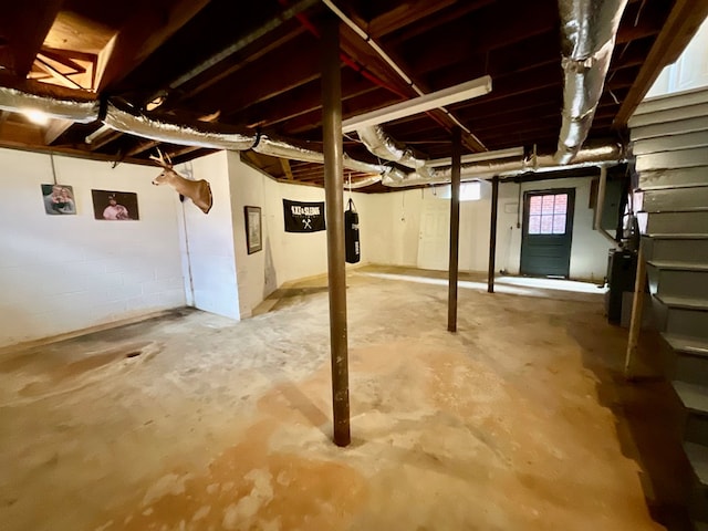 basement with concrete block wall