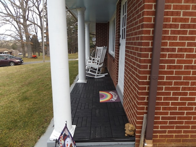 wooden terrace with covered porch