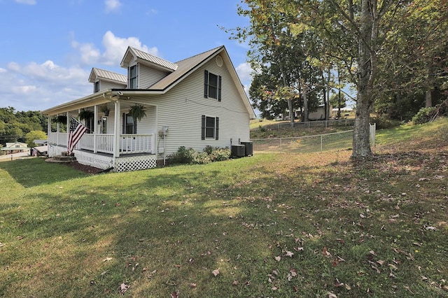 178 Woodside Dr, Chilhowie, VA 24319 - view of property exterior with a porch, central air condition unit, and metal roof