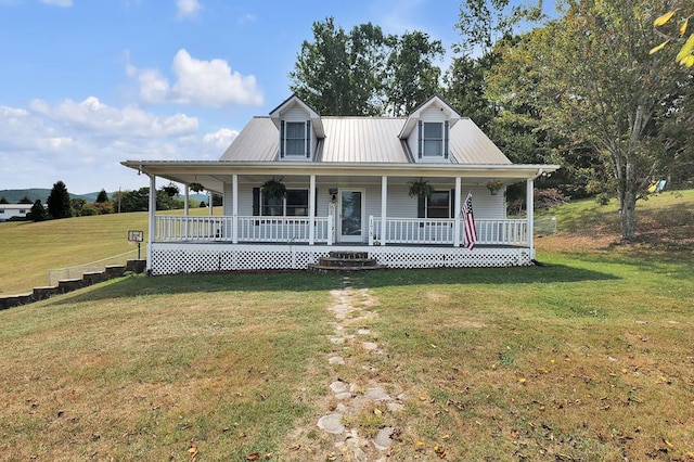 178 Woodside Dr, Chilhowie, VA 24319 - farmhouse featuring a front yard, covered porch, and metal roof