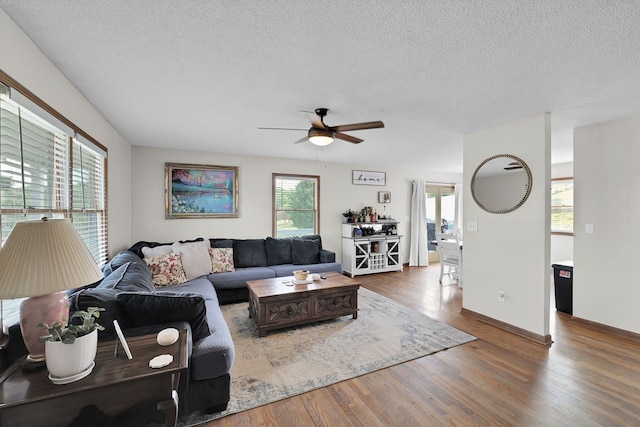 178 Woodside Dr, Chilhowie, VA 24319 - living room featuring ceiling fan, wood finished floors, a textured ceiling, and baseboards