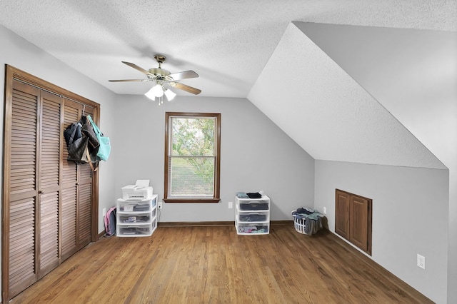 178 Woodside Dr, Chilhowie, VA 24319 - bonus room with a textured ceiling, wood finished floors, ceiling fan, lofted ceiling, and baseboards