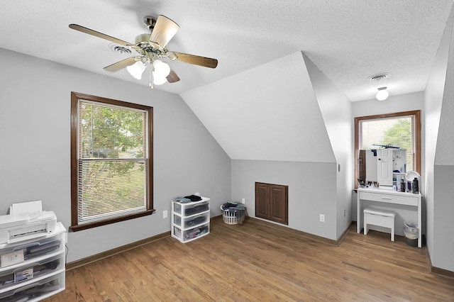178 Woodside Dr, Chilhowie, VA 24319 - bonus room featuring wood finished floors, a ceiling fan, a textured ceiling, and lofted ceiling