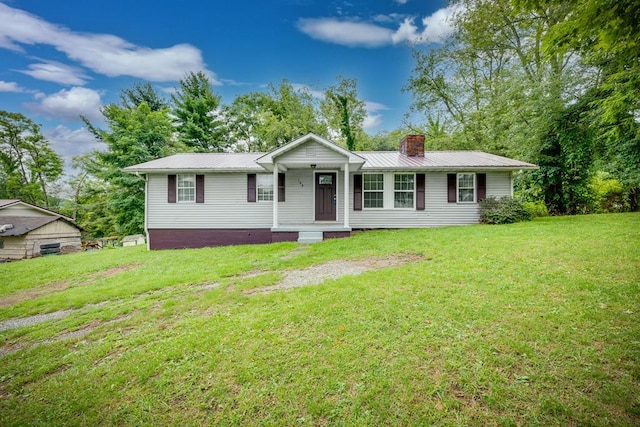 103 Whites Subdivision Rd, Cedar Bluff, VA 24609 - single story home featuring a chimney, a porch, a front yard, and metal roof