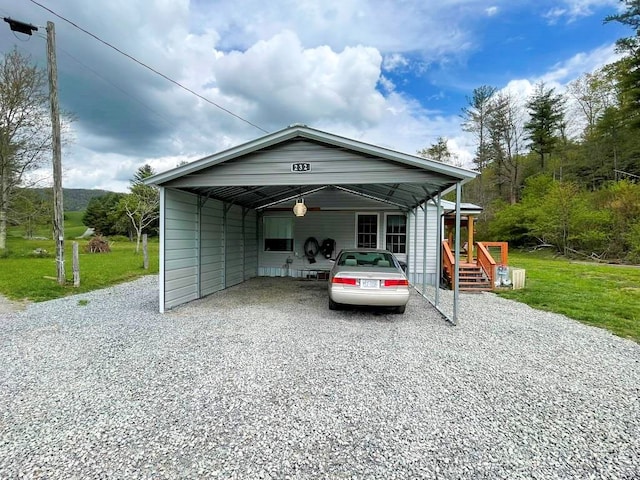 232 Echo Ridge Ln, Elk Creek, VA 24326 - view of front of property with gravel driveway, a detached carport, and a front lawn