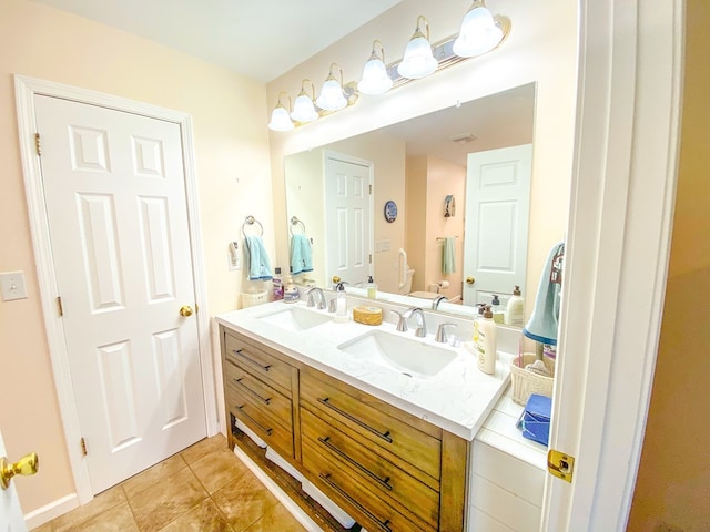 1476 E Blue Grass Trl, Bland, VA 24315 - full bath featuring double vanity, toilet, and tile patterned flooring