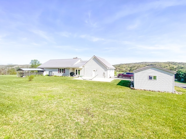 1476 E Blue Grass Trl, Bland, VA 24315 - back of property with a lawn