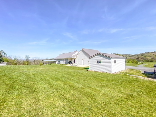 1476 E Blue Grass Trl, Bland, VA 24315 - view of green lawn with an outbuilding