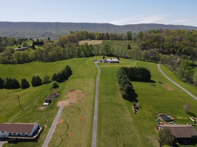 1476 E Blue Grass Trl, Bland, VA 24315 - aerial view of property's location with rural landscape and a mountain backdrop