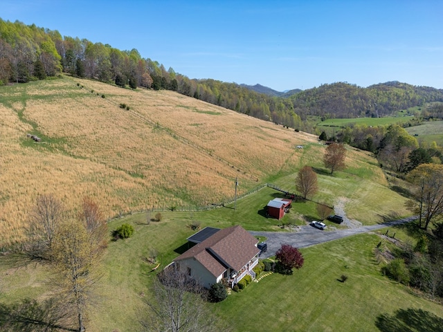 bird's eye view featuring a rural view and a mountain view