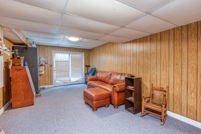 9433 Legend Dr, Glade Spring, VA 24340 - living area with a paneled ceiling, wooden walls, and carpet