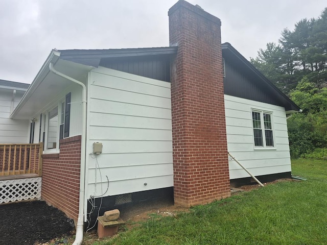 9433 Legend Dr, Glade Spring, VA 24340 - view of side of home featuring a chimney and a yard