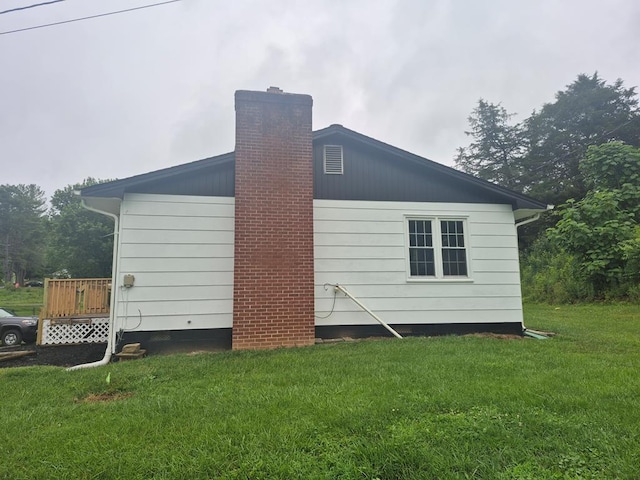 9433 Legend Dr, Glade Spring, VA 24340 - view of side of property with a chimney and a yard