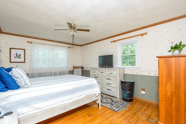 9433 Legend Dr, Glade Spring, VA 24340 - bedroom featuring wallpapered walls, wood finished floors, crown molding, and a ceiling fan