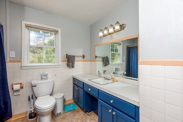 9433 Legend Dr, Glade Spring, VA 24340 - full bath featuring vanity, tile walls, wainscoting, and a shower with curtain