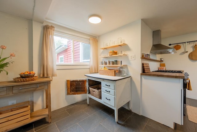 interior space with heating unit and dark tile patterned floors
