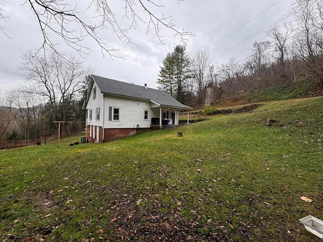 196 Goodwin Rd, Cedar Bluff, VA 24609 - back of house featuring a yard