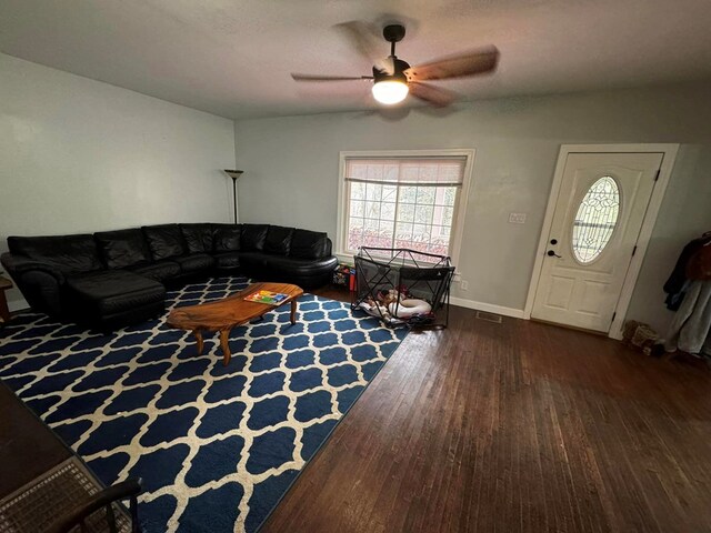 196 Goodwin Rd, Cedar Bluff, VA 24609 - living room featuring wood finished floors, ceiling fan, and baseboards