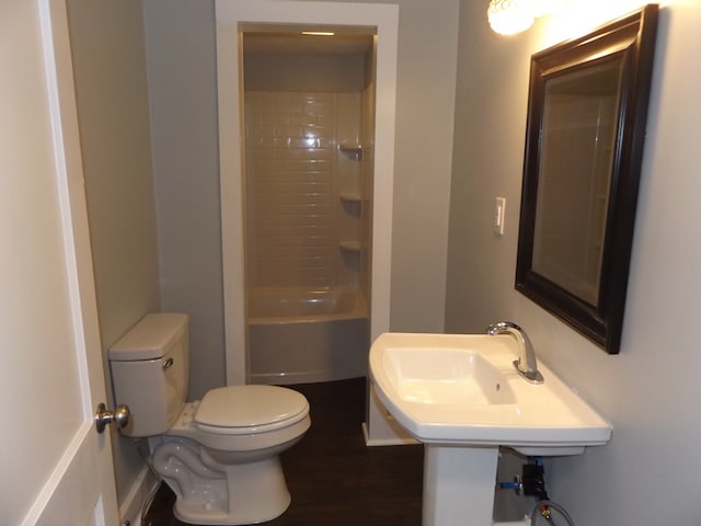 bathroom featuring  shower combination and toilet