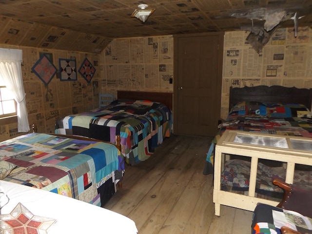 548 Archie Ave, Laurel Fork, VA 24352 - bedroom featuring hardwood / wood-style flooring and lofted ceiling