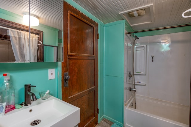 full bathroom with a sink and shower / bath combo
