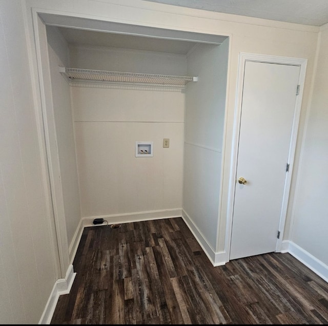 clothes washing area featuring baseboards, dark wood-style floors, laundry area, and washer hookup