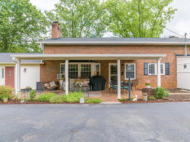 503 Court St, Abingdon, VA 24210 - view of front of house with a chimney and brick siding