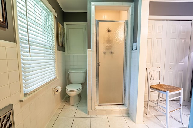 503 Court St, Abingdon, VA 24210 - full bathroom featuring tile walls, a closet, a stall shower, tile patterned floors, and crown molding