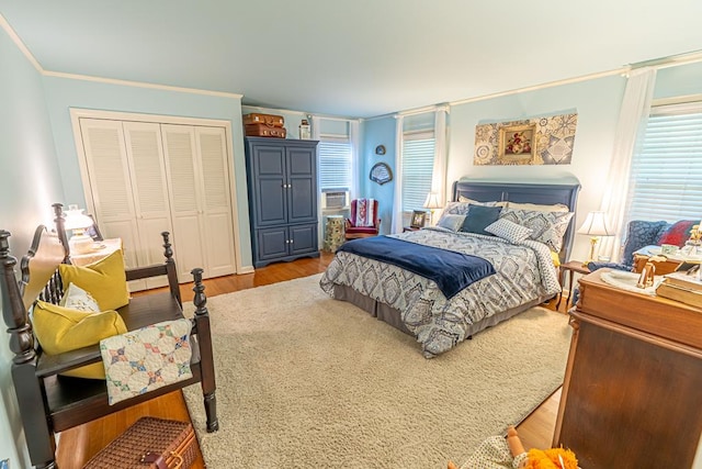 503 Court St, Abingdon, VA 24210 - bedroom featuring wood finished floors, ornamental molding, a closet, and cooling unit