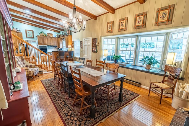 503 Court St, Abingdon, VA 24210 - dining room featuring light wood-style flooring, a chandelier, stairs, a baseboard radiator, and cooling unit