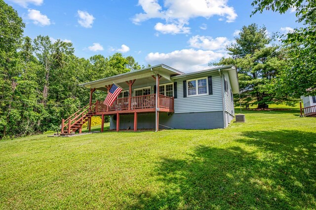 575 Apache Trl, Fancy Gap, VA 24328 - rear view of property featuring stairs, a lawn, and a wooden deck