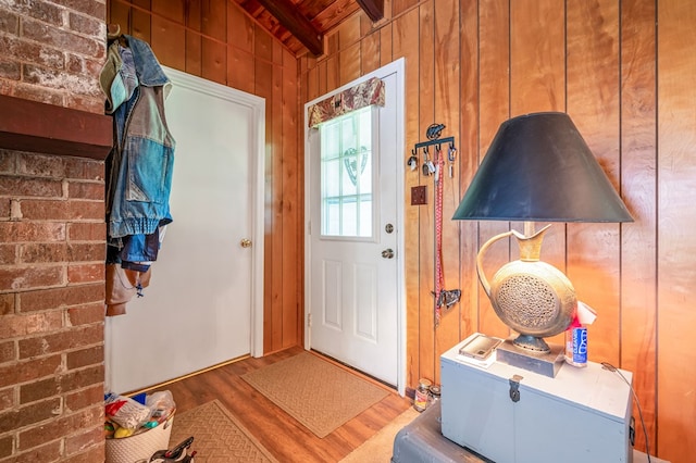 575 Apache Trl, Fancy Gap, VA 24328 - entrance foyer featuring wood walls, wood finished floors, and a wooden ceiling with exposed beams