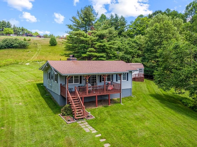 575 Apache Trl, Fancy Gap, VA 24328 - rear view of property with a porch, a yard, a chimney, and stairs
