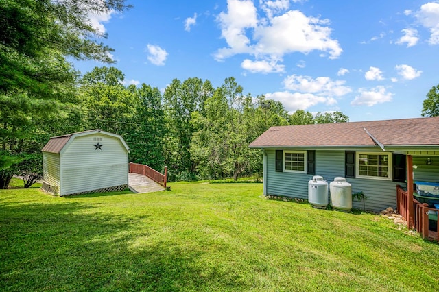 575 Apache Trl, Fancy Gap, VA 24328 - view of grassy yard featuring a storage unit
