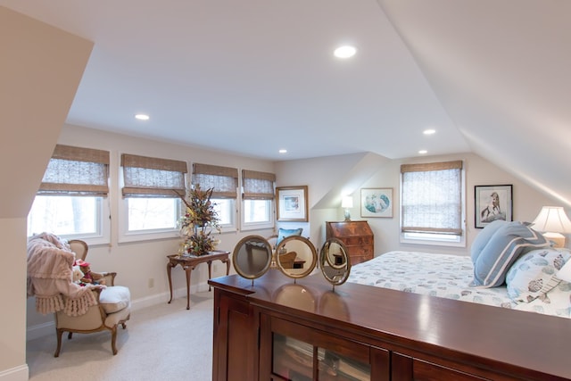 bedroom with light carpet, vaulted ceiling, baseboards, and recessed lighting