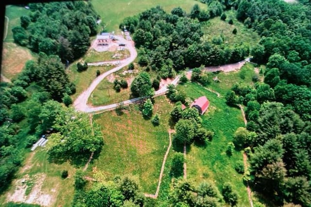 birds eye view of property featuring a rural view