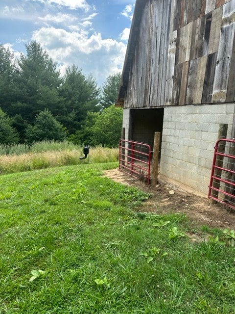 view of outbuilding featuring an outbuilding and an exterior structure