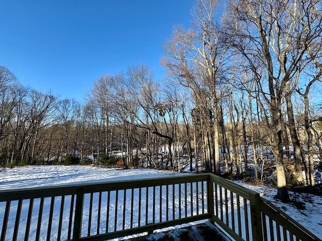 view of snow covered deck