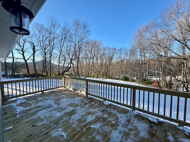 view of snow covered deck