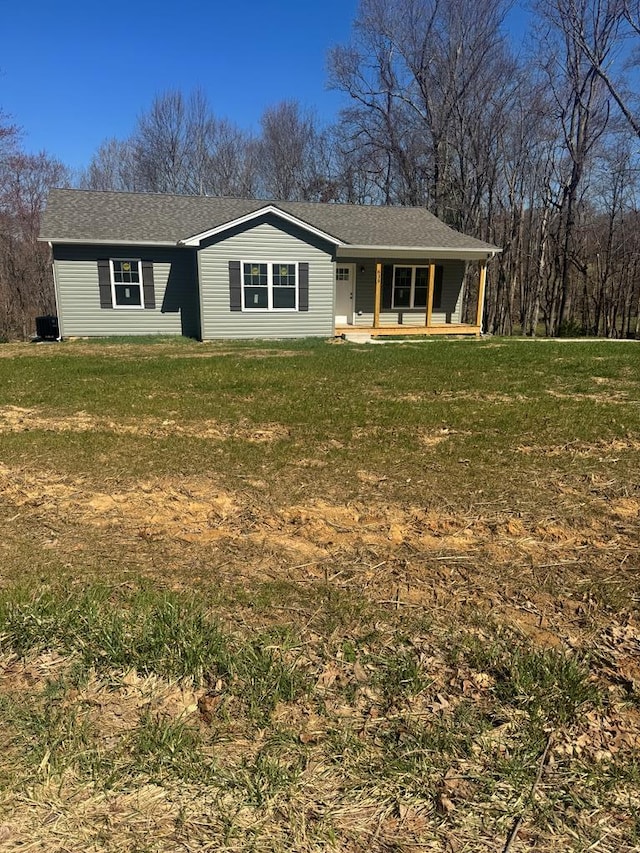 view of front of home featuring a porch and a front yard