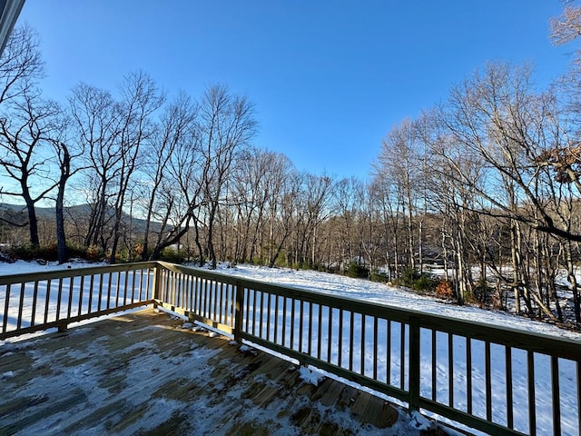 view of snow covered deck