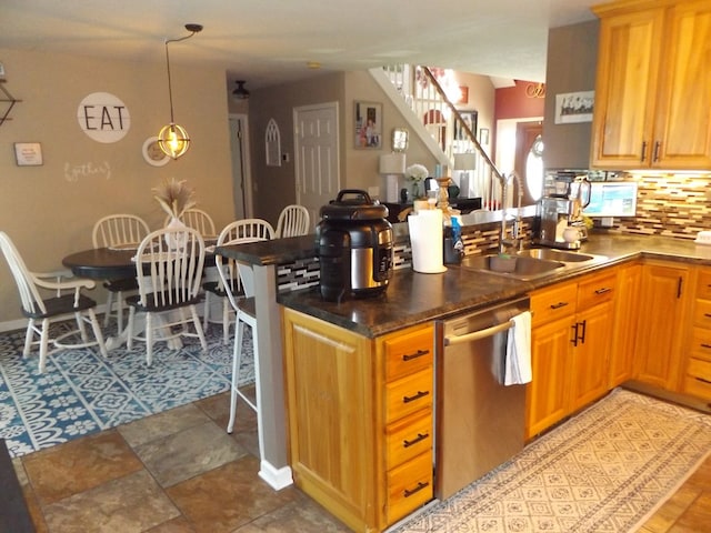 566 Breezy Ridge Rd, Woodlawn, VA 24381 - kitchen with stainless steel dishwasher, a peninsula, backsplash, dark countertops, and hanging light fixtures