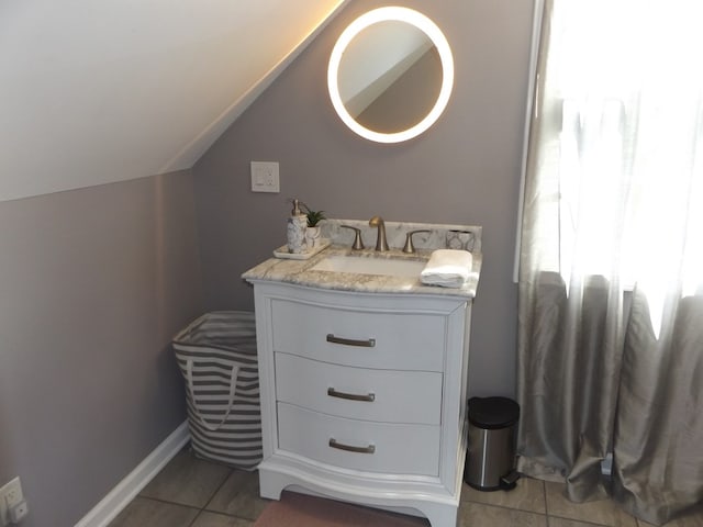 566 Breezy Ridge Rd, Woodlawn, VA 24381 - bathroom with tile patterned flooring, vanity, and lofted ceiling