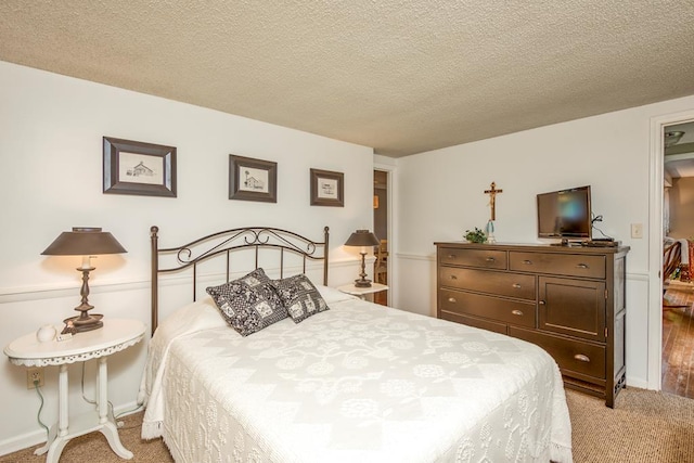 18357 Westwood Dr, Abingdon, VA 24211 - bedroom with light colored carpet and a textured ceiling