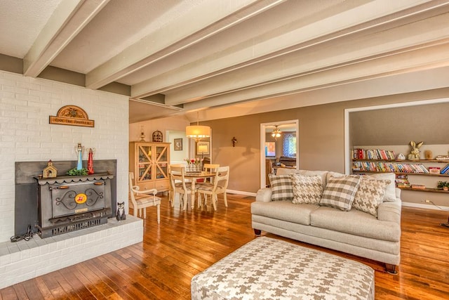 18357 Westwood Dr, Abingdon, VA 24211 - living area featuring hardwood / wood-style flooring, beam ceiling, and a fireplace