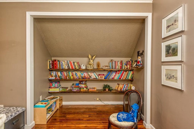 18357 Westwood Dr, Abingdon, VA 24211 - sitting room with vaulted ceiling, wood finished floors, and a textured ceiling