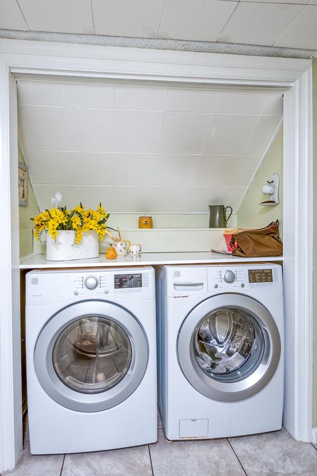 18357 Westwood Dr, Abingdon, VA 24211 - laundry area featuring washer and dryer and light tile patterned floors