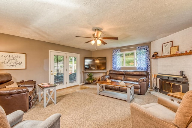18357 Westwood Dr, Abingdon, VA 24211 - living area featuring a fireplace, ceiling fan, carpet, and a textured ceiling