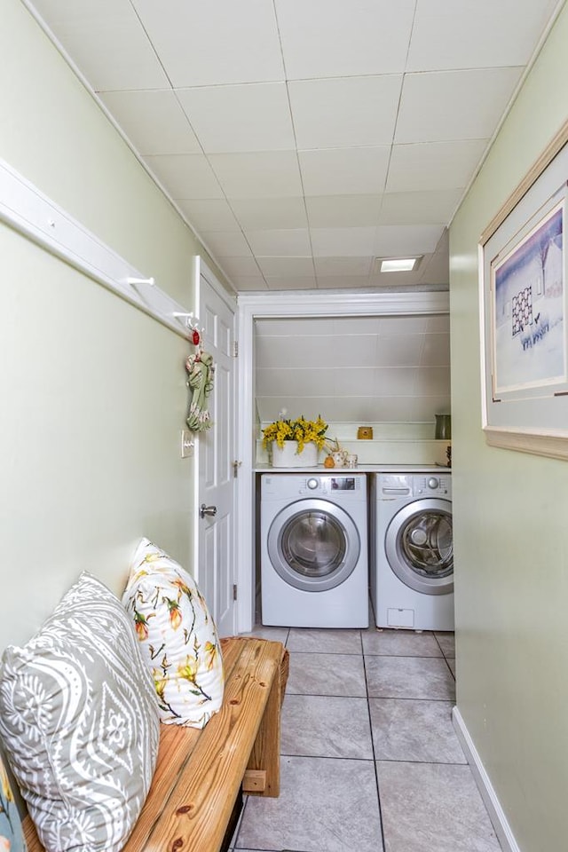 18357 Westwood Dr, Abingdon, VA 24211 - laundry area with separate washer and dryer and light tile patterned floors