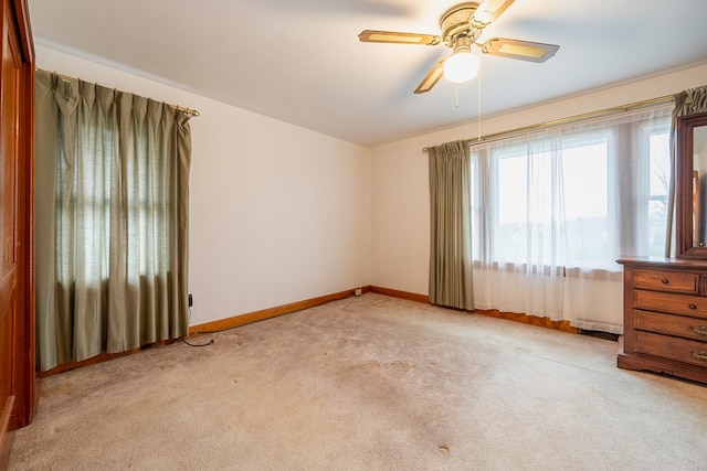 480 N 3rd St, Wytheville, VA 24382 - spare room featuring carpet floors, baseboards, and a ceiling fan